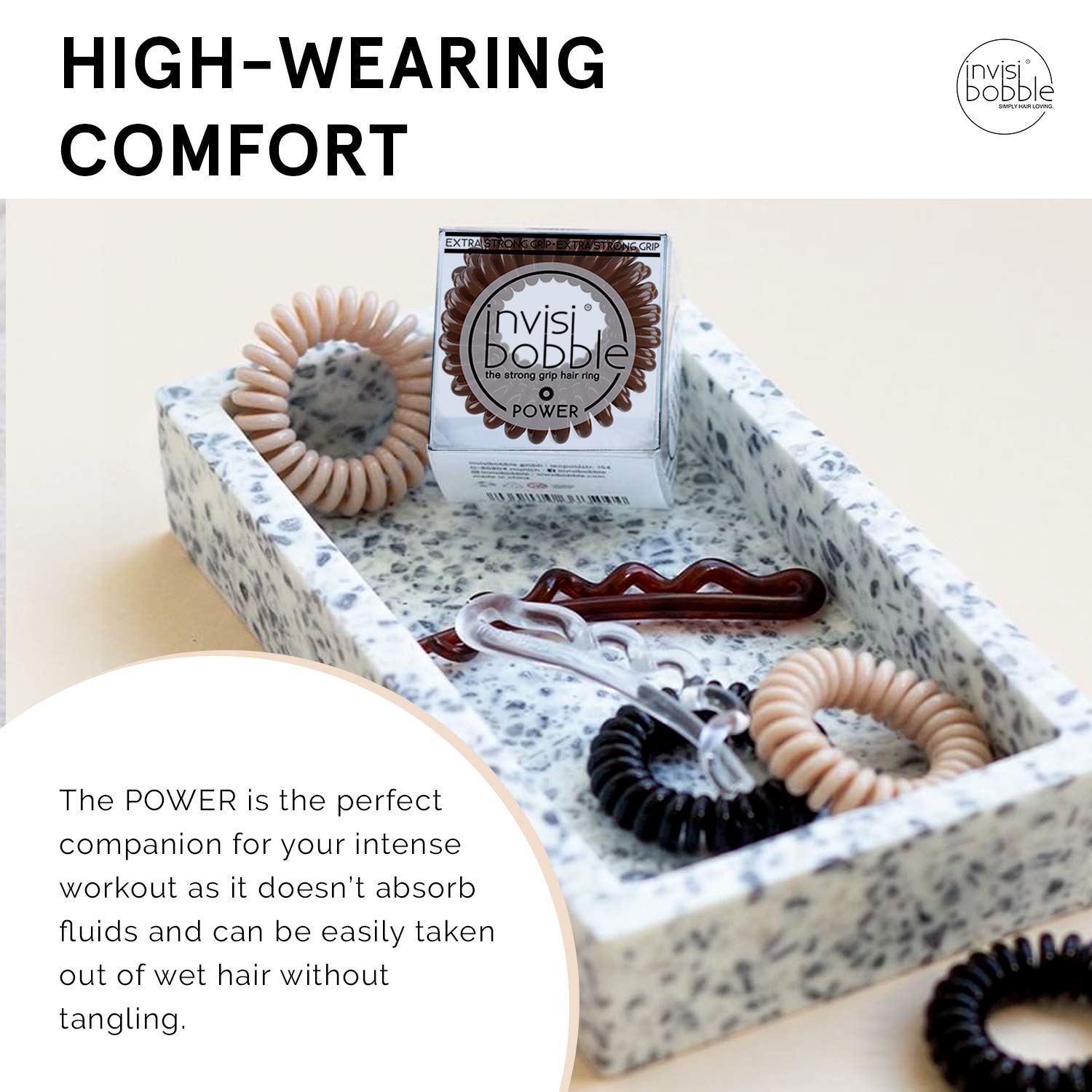 invisibobble on wet hair by pool showing waterproof, no-slip performance