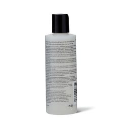 ion Silk Drops pump dispensing serum demonstrating controlled, mess-free use