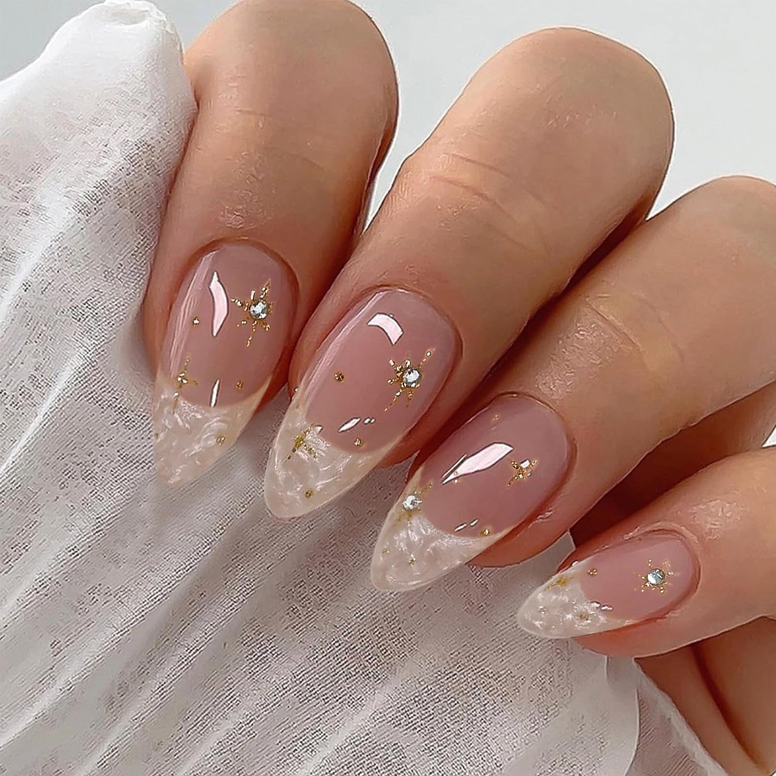 IQXGE close-up of rhinestones and gold glitter adding sparkle and luxe detail
