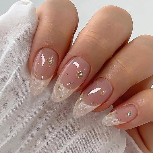 IQXGE close-up of rhinestones and gold glitter adding sparkle and luxe detail