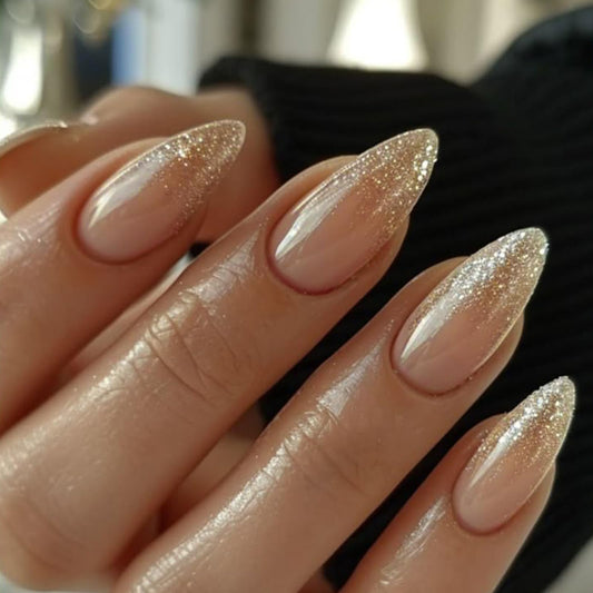IQXGE front packaging showing 24-piece nude almond press-on nails with glitter, ready to wear