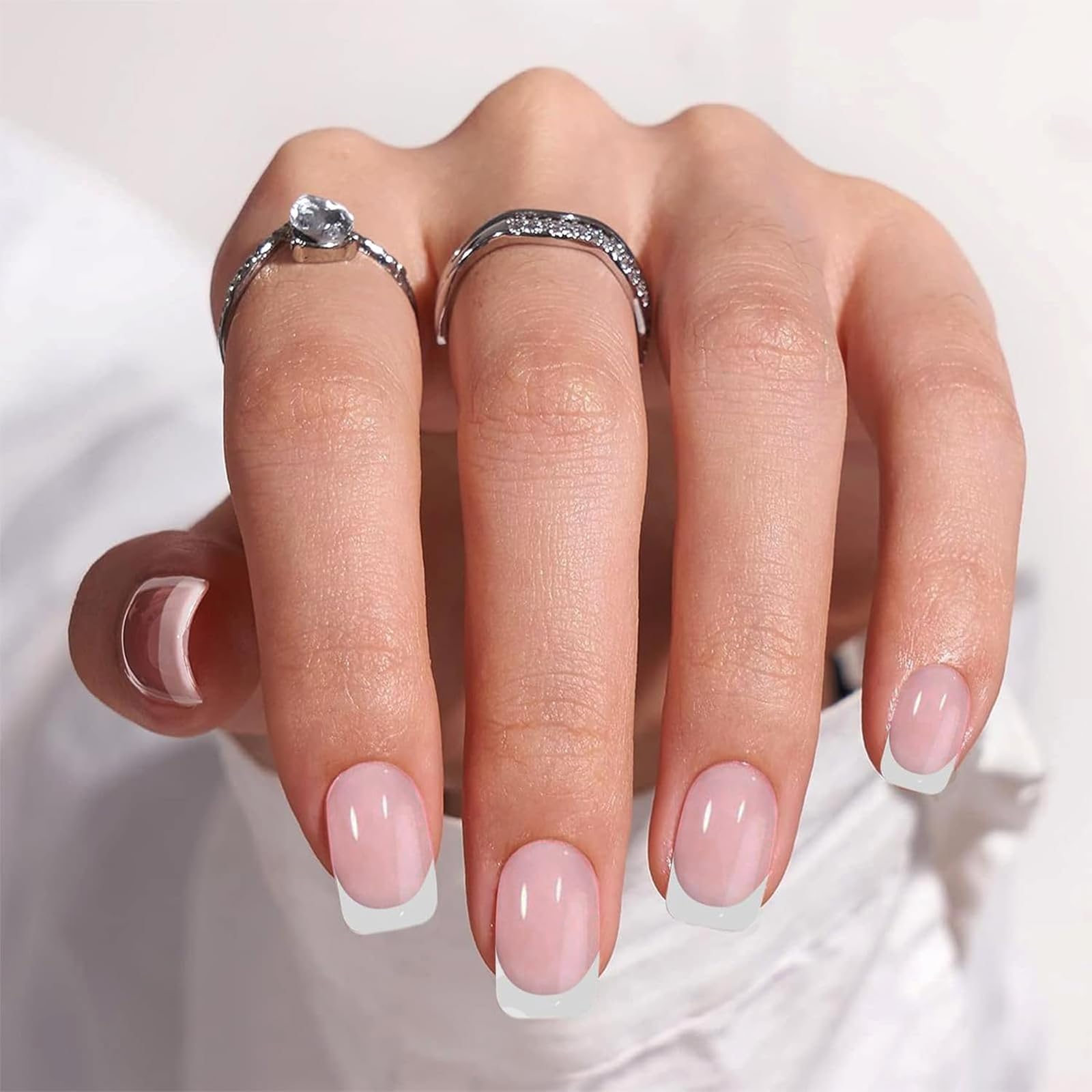 IQXGE nail strips curing under a UV lamp providing fast hardening and shine