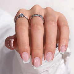 IQXGE nail strips curing under a UV lamp providing fast hardening and shine