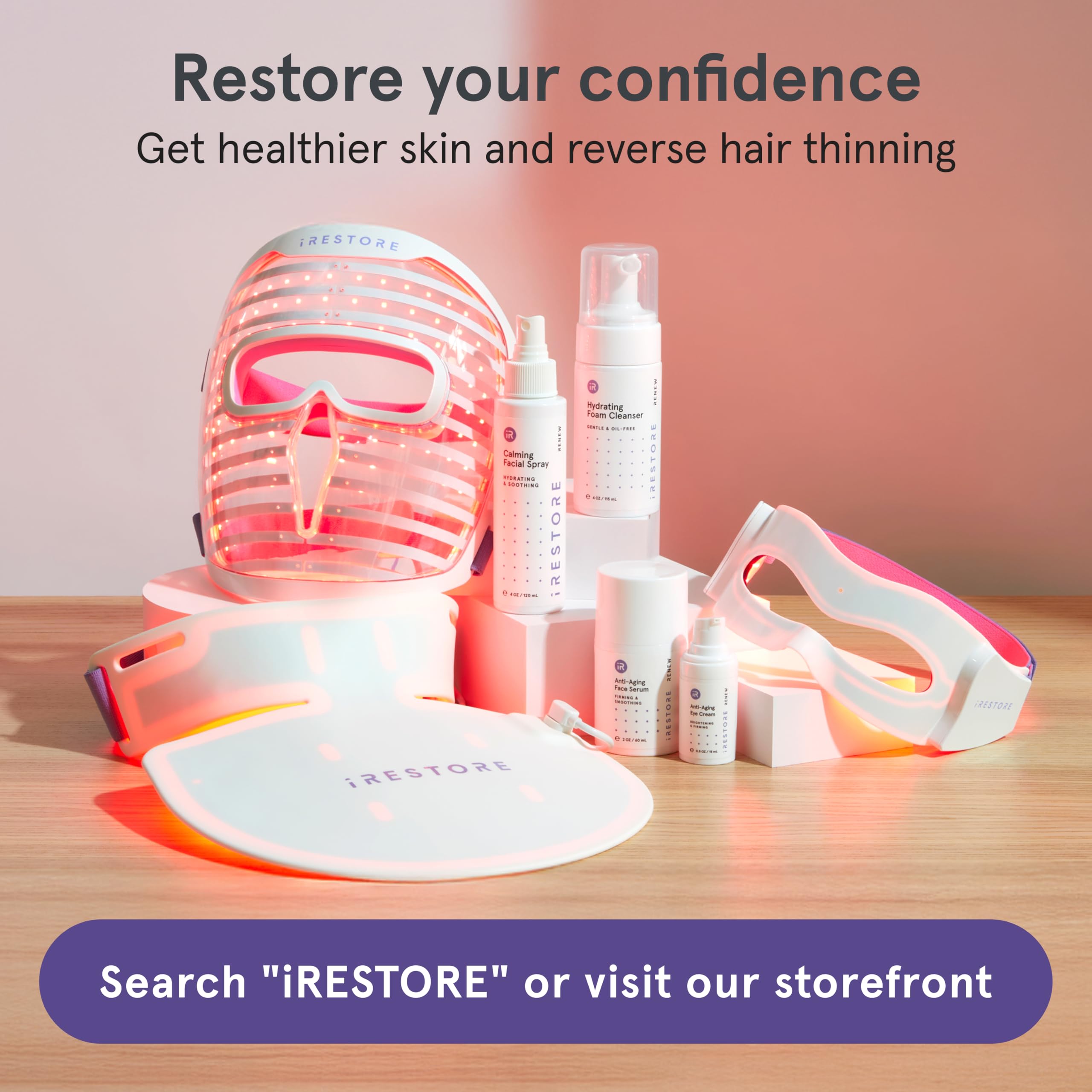 iRestore next to smartphone for size comparison and portability benefit
