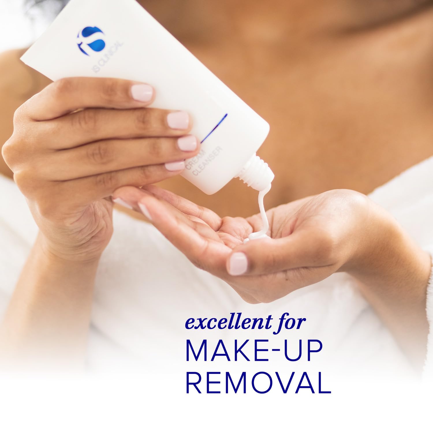iS CLINICAL being applied on face to remove makeup while soothing skin