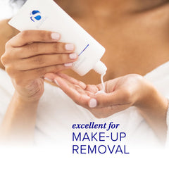 iS CLINICAL being applied on face to remove makeup while soothing skin