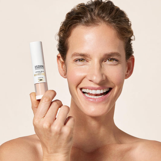 ISDIN brush applicator close-up demonstrating smooth, no-mess application