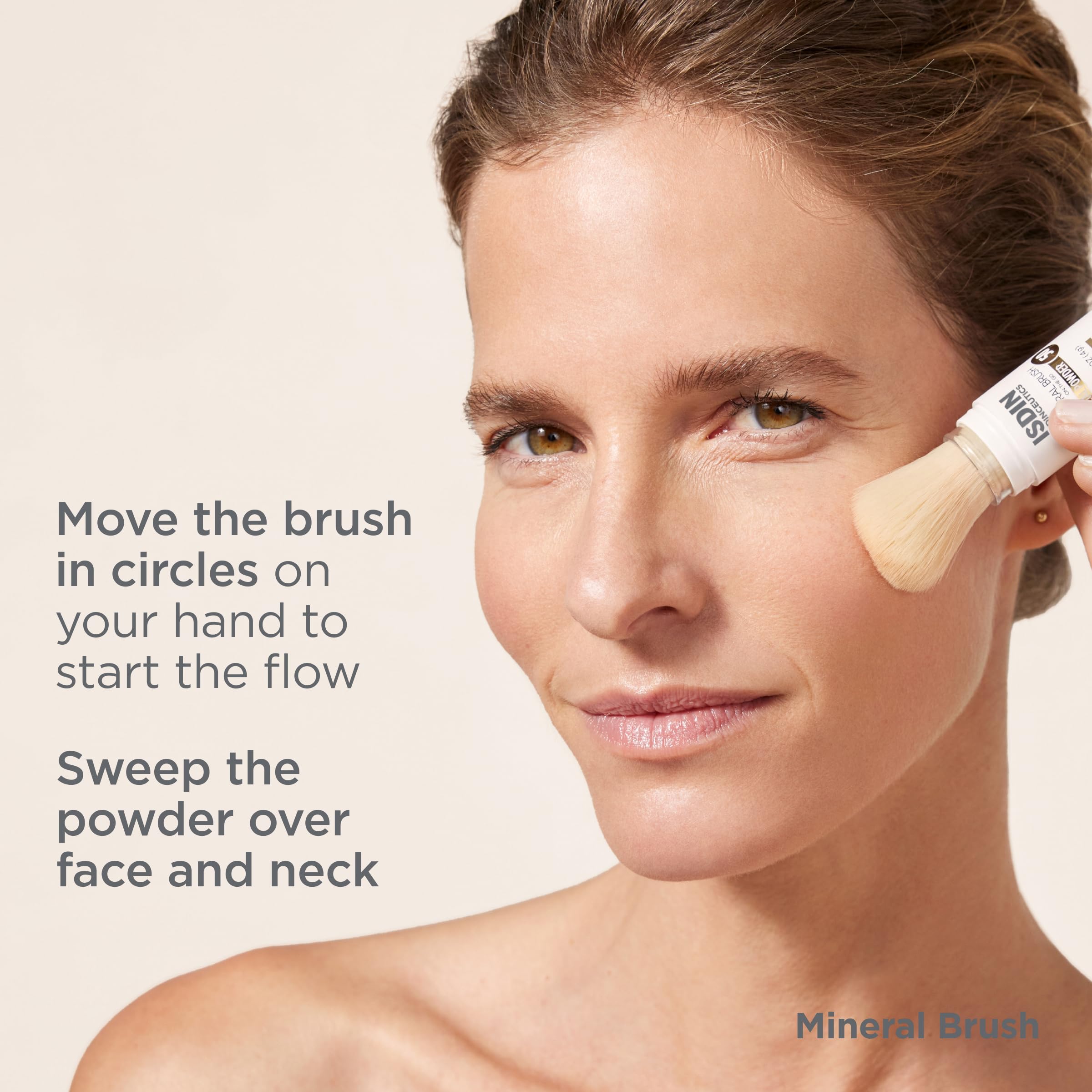ISDIN compact open showing powder pan for easy reapplication on-the-go