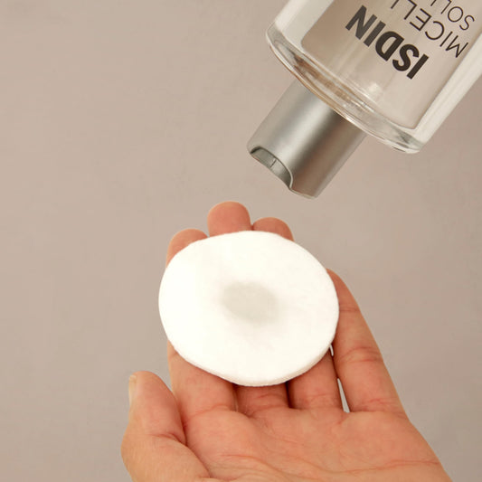 ISDIN back label close-up displaying ingredients and hypoallergenic note