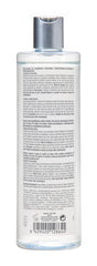 ISDIN bottle next to common object showing 13.5 fl oz size and value