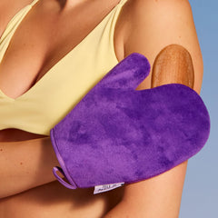 Isle of Paradise mitt used on face for gentle blending and natural-looking glow