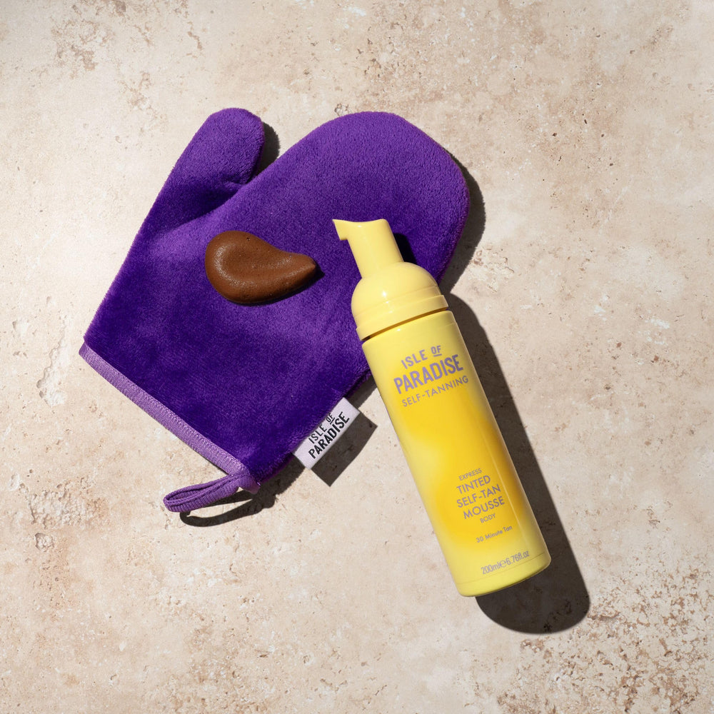 Isle of Paradise mitt beside a hand showing fit and scale for controlled application