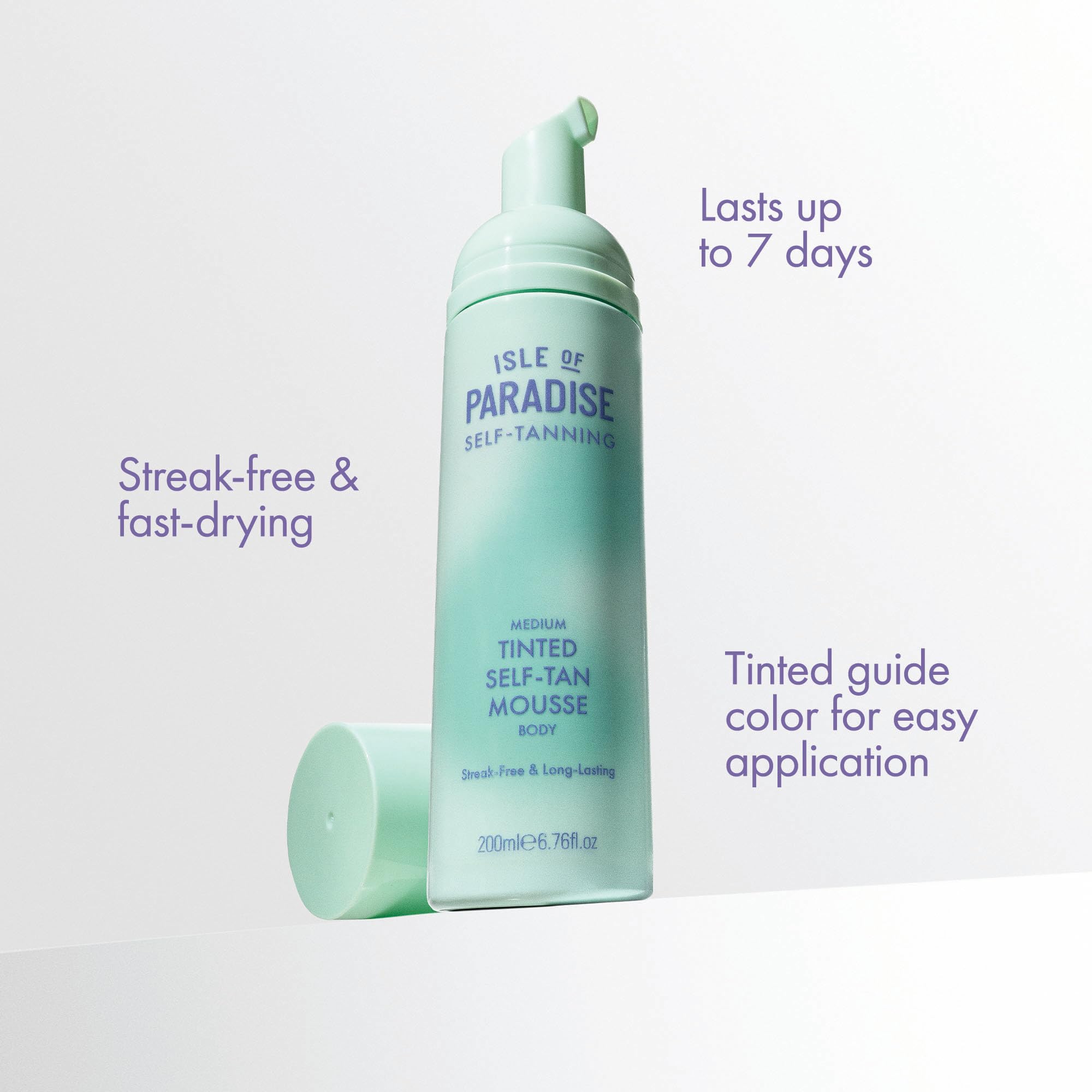 Isle of Paradise mousse on application mitt showing guided application and streak-free finish