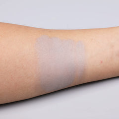 IS'MINE shade swatches on arm displaying true grey payoff and layering options