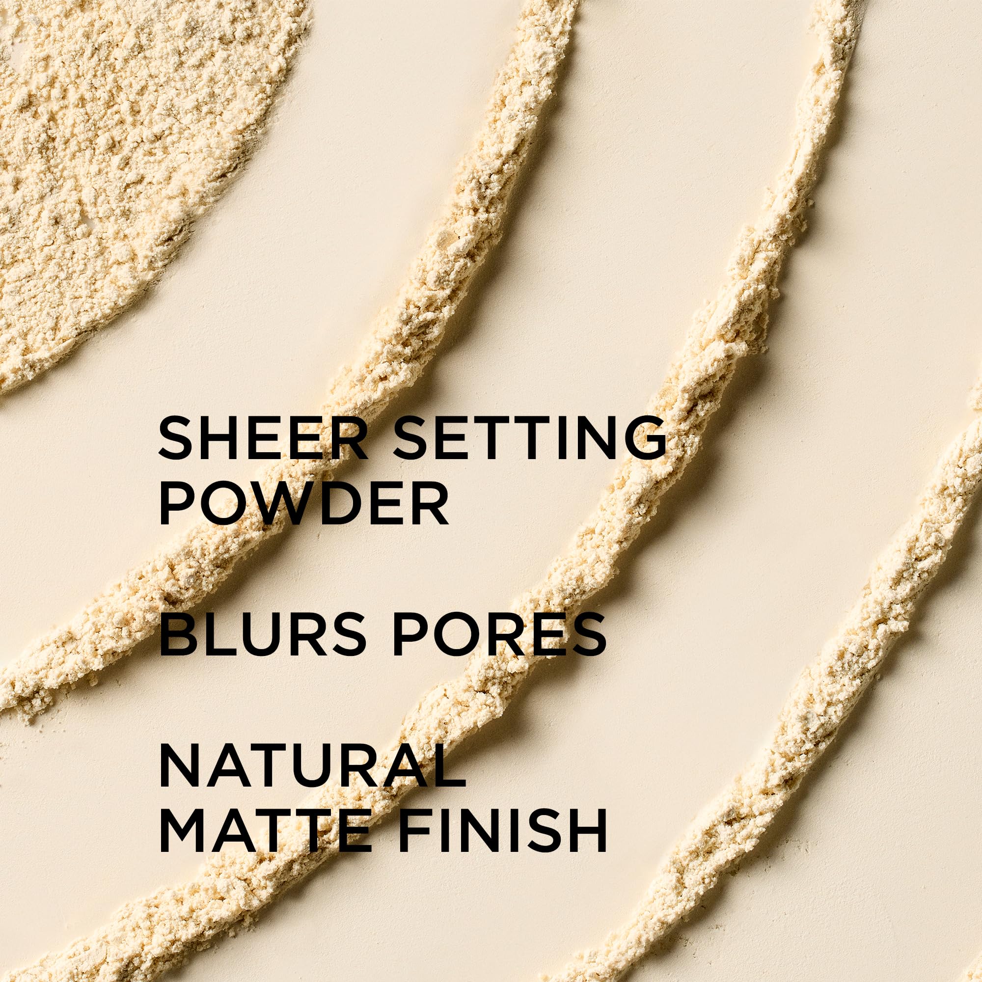 IT Cosmetics powder brush applying product to T-zone for shine control and soft finish