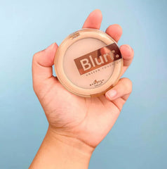 Italia Deluxe compact in hand illustrating size and travel-friendly convenience for on-the-go use