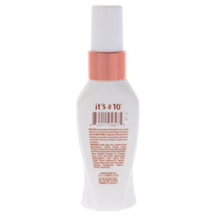 It's a 10 Coily Miracle Leave-In creamy texture on hand demonstrating slip and easy application
