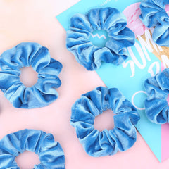 IVARYSS scrunchie in hand showing 4.3-inch fit and easy-to-wrap elastic