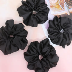 IVARYSS scrunchie holding a high ponytail showing firm hold benefit