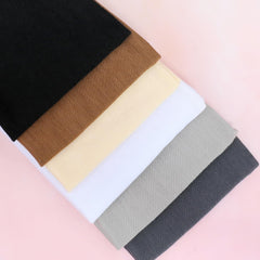 IVARYSS label and material tag showing polyester-spandex blend for stretchy durability