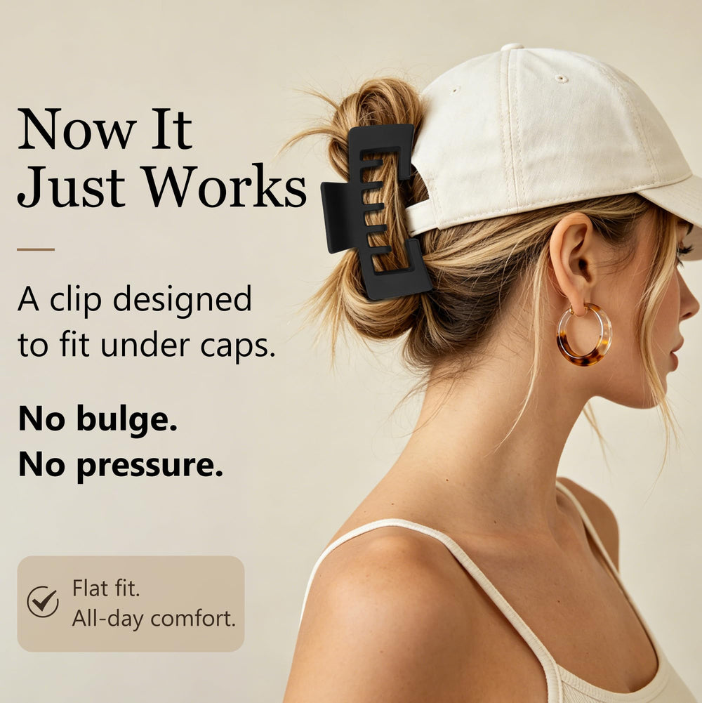 Ivyu clip securing a ponytail while worn with a baseball cap for comfort