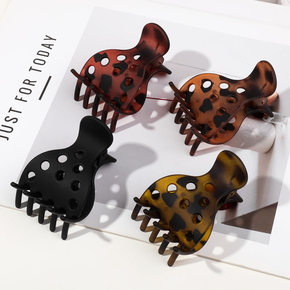 Ivyu clips in hand for scale to show compact, travel-friendly size