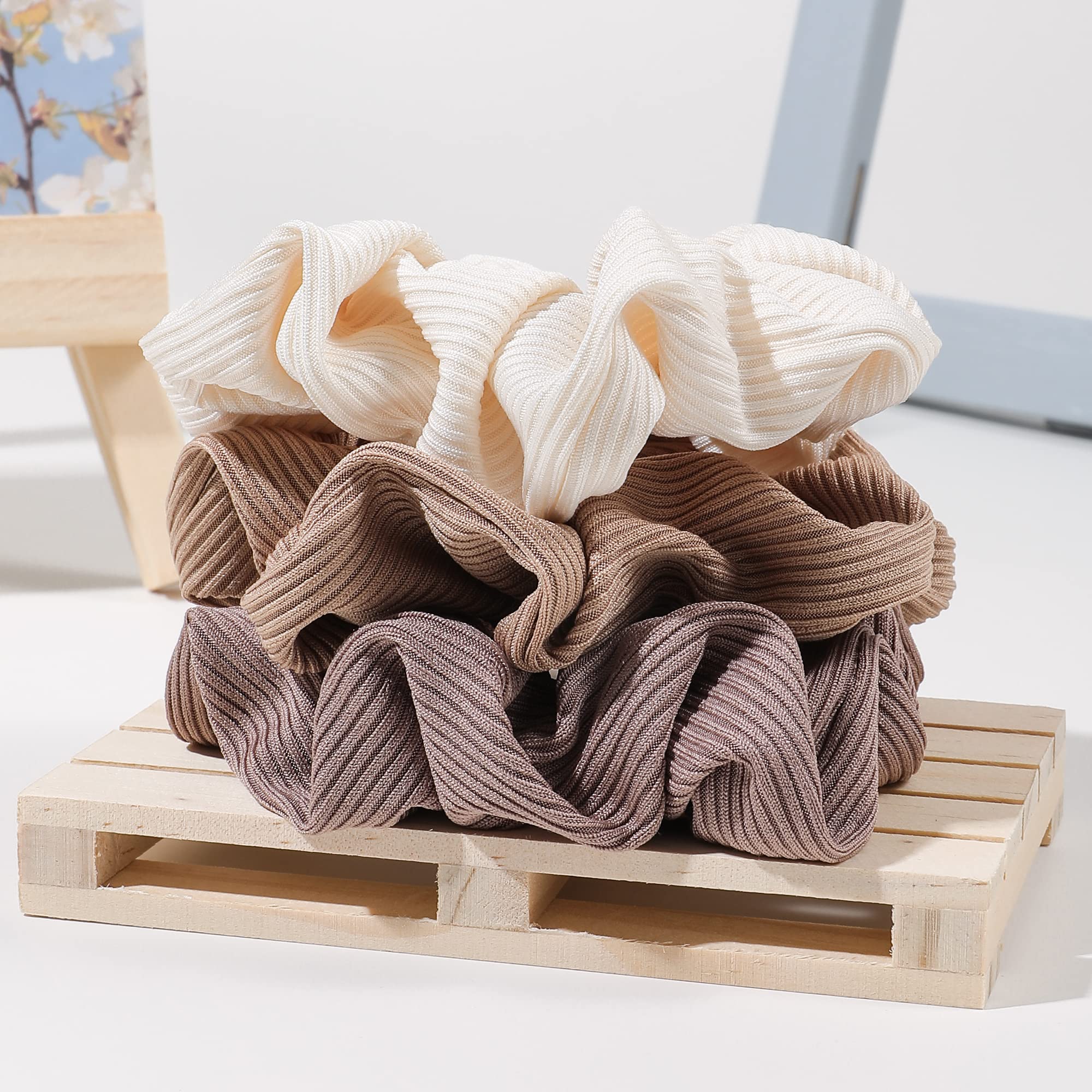 Ivyu scrunchie styling in a bun to showcase polished look