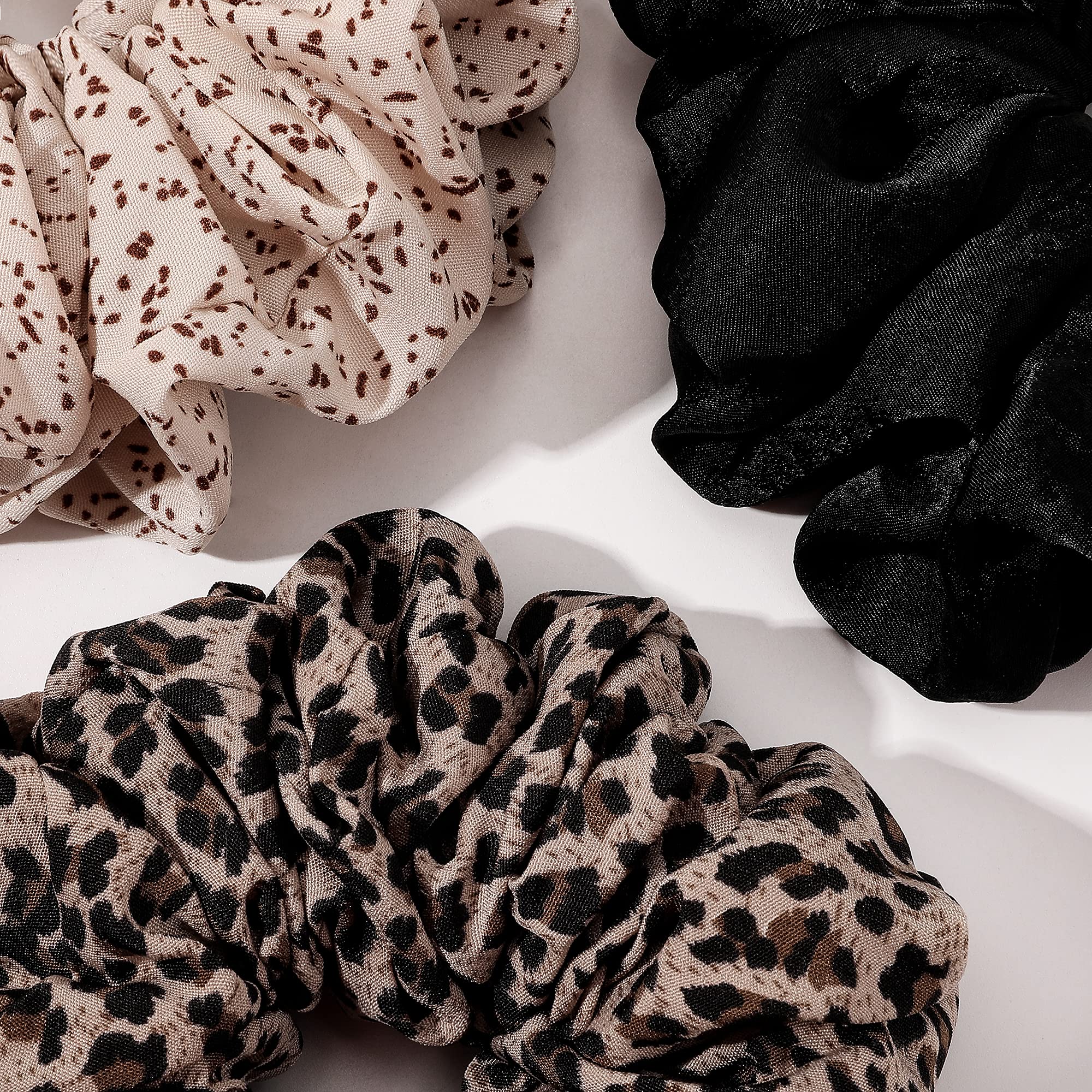 Ivyu scrunchie in a high ponytail demonstrating secure hold without creases