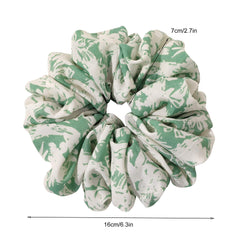 Ivyu scrunchie holding a high bun demonstrates secure hold for thick hair