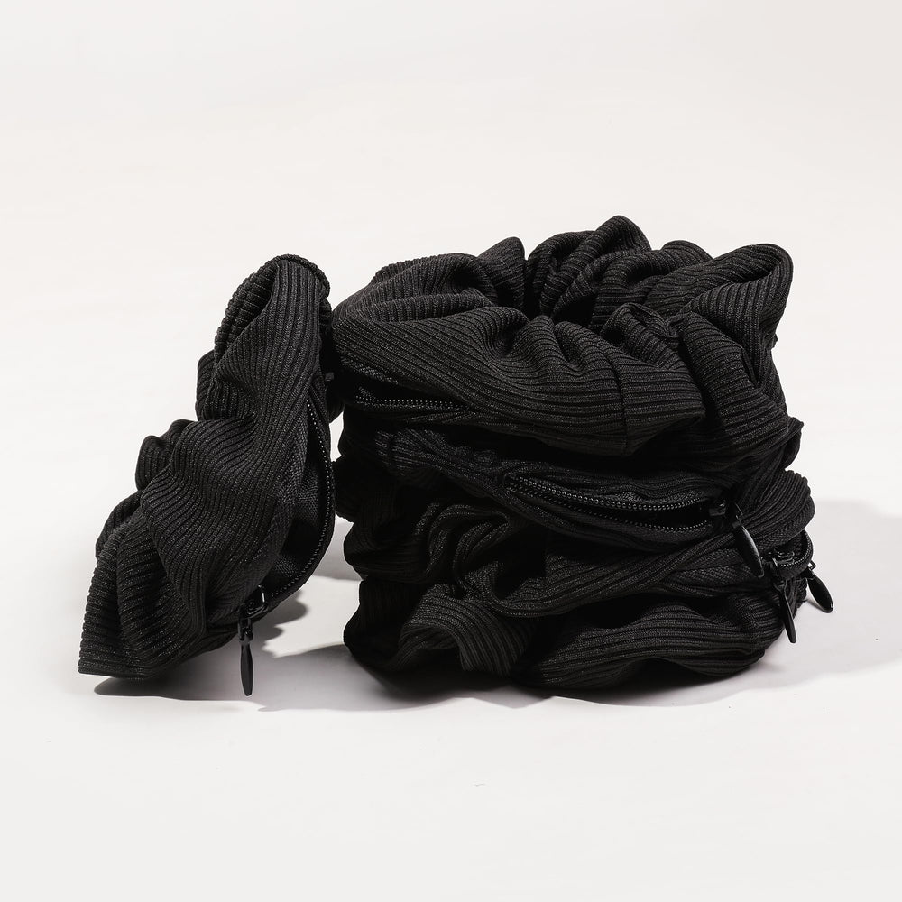 Ivyu scrunchie pocket open with cash and lipstick showing convenience