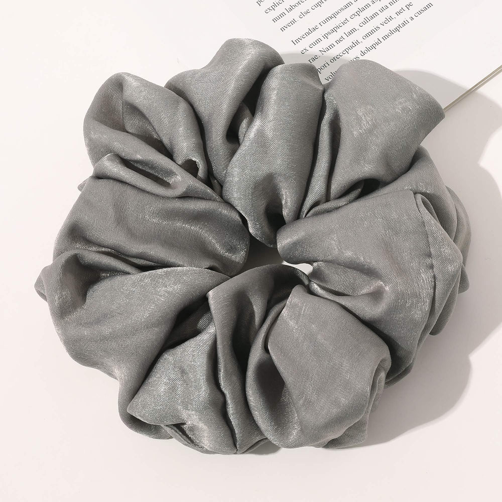 Ivyu scrunchie styled in a neat bun for polished look