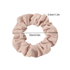 Ivyu scrunchie worn in a ponytail demonstrating secure non-creased hold