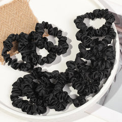 Ivyu scrunchie worn single-loop on fine hair for light, comfortable grip