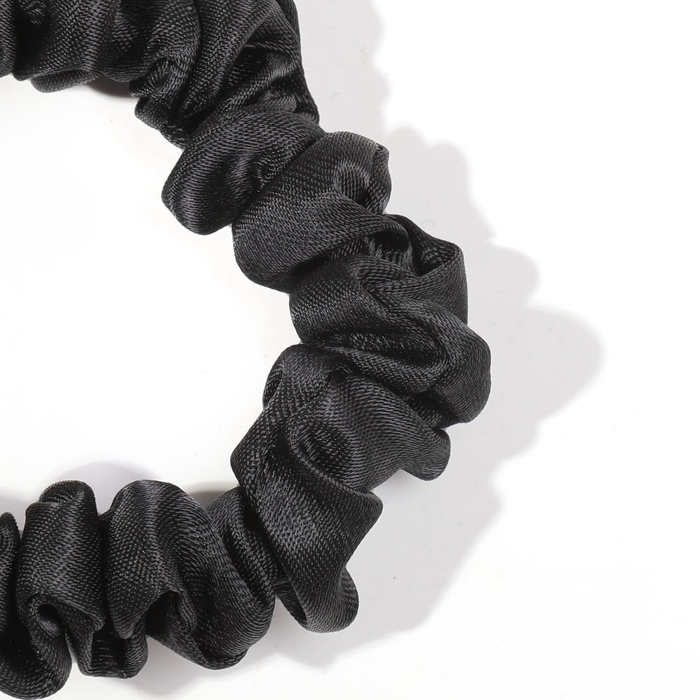 Ivyu scrunchies arranged on vanity, offering a polished accessory display