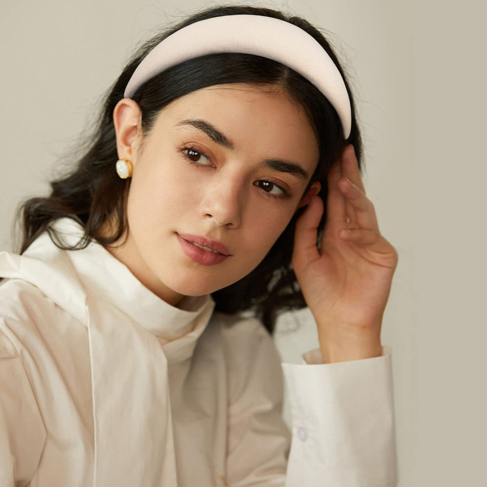 Ivyu headband beside ruler showing compact size and travel-friendly dimensions