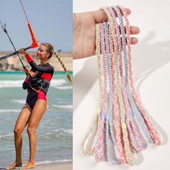 Ivyu hair tie shown on hand to demonstrate length and stretch