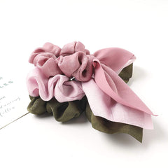Ivyu scrunchie worn in a high ponytail for secure, gentle lift