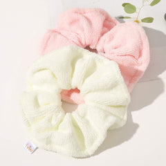 Ivyu wrapped on curly hair reducing frizz and protecting strands