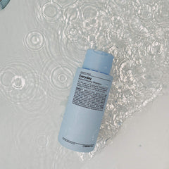 J Beverly Hills close-up of shampoo lather texture demonstrating rich foam and gentle cleansing