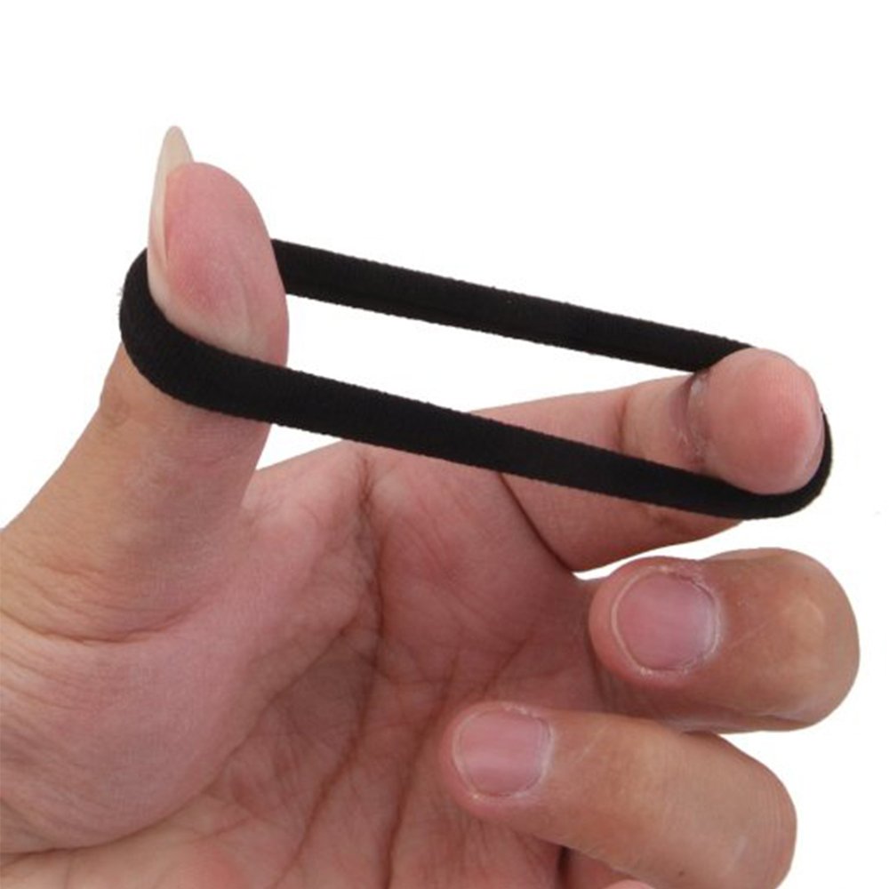 J-MEE band in hand for size comparison showing easy-grip benefit