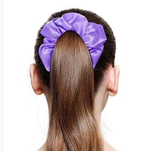 Jaciya scrunchie securing a ponytail for secure hold and no creases