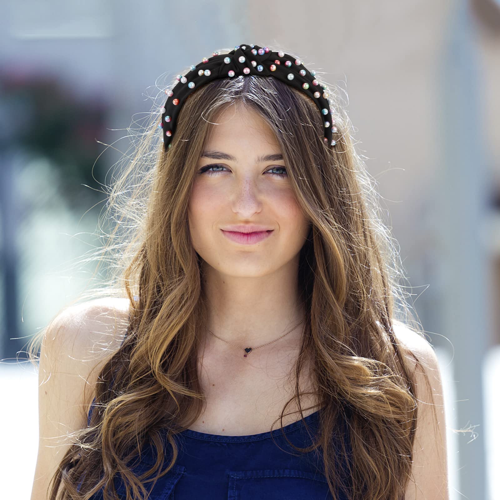 Jaciya headband beside ruler showing 2.36-inch width for coverage