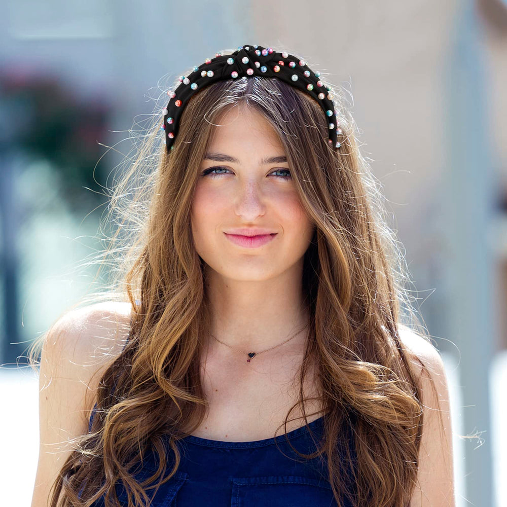 Jaciya headband beside ruler showing 2.36-inch width for coverage