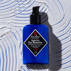 jack black open cap revealing sunscreen cream for daily protection