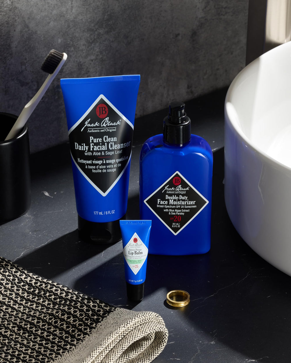 Jack Black lip balm in pocket with keys for on-the-go convenience