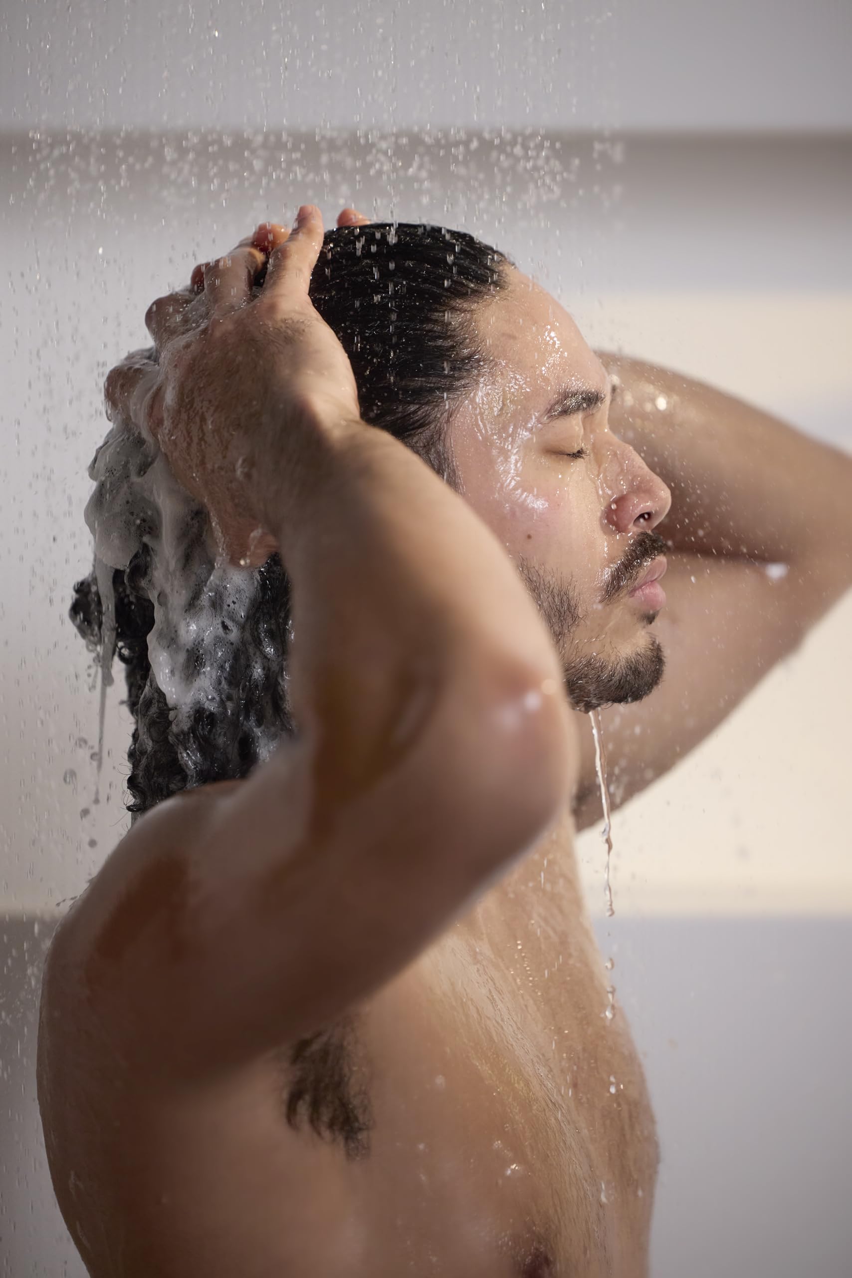 Jack Black turbo wash in shower demonstrating energizing use after workout
