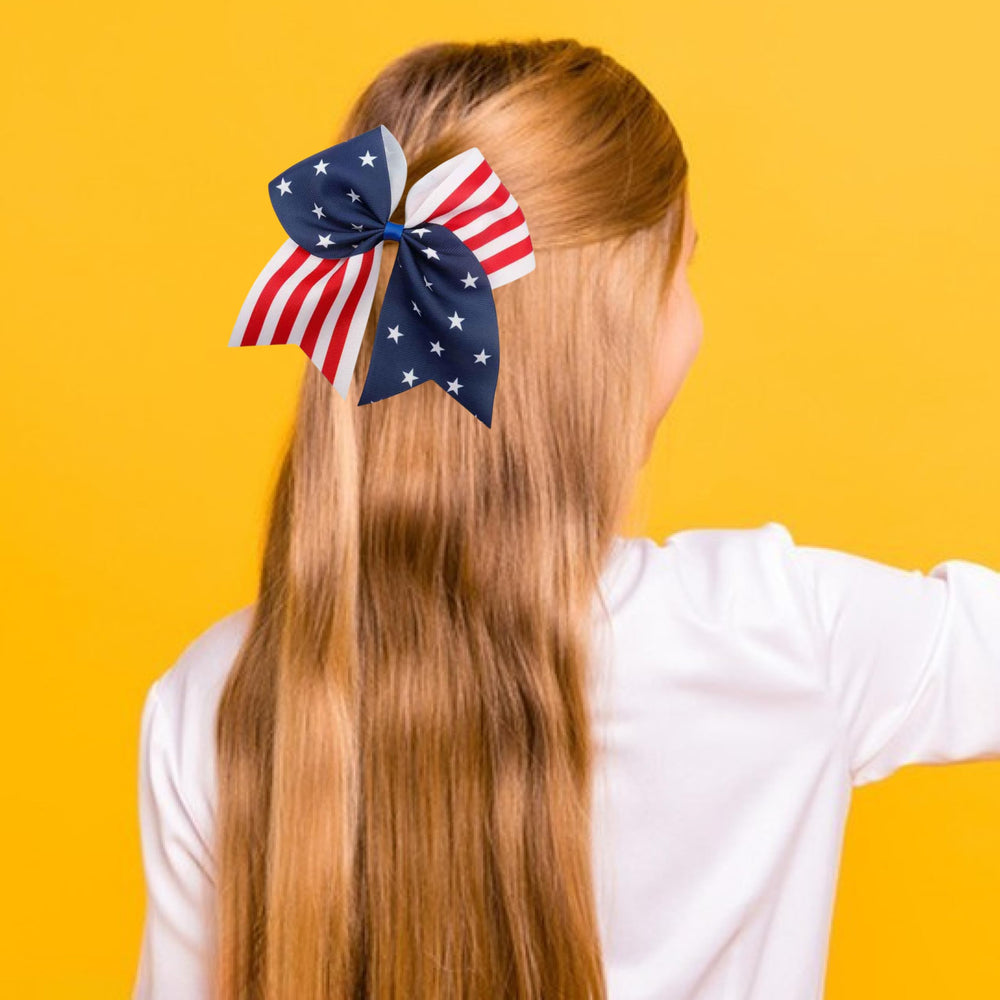 Jacnkb hair bow worn in ponytail highlighting visible patriotic accent