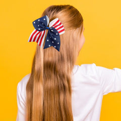 Jacnkb hair bow worn in ponytail highlighting visible patriotic accent