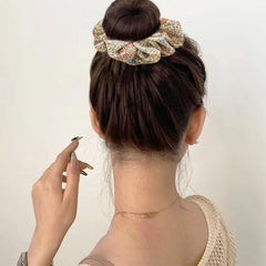Jaczora scrunchie in outfit setting, adds color and coordinates outfits