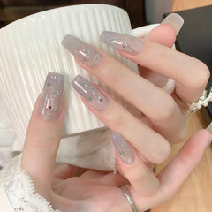 Jaliya tweezers positioning a sequin on nail showing precise application benefit